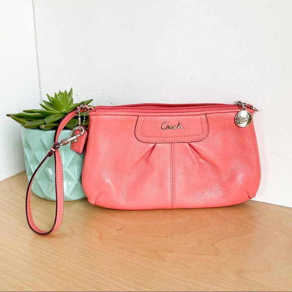 Coach Handbags - Coral Leather COACH Wristlet Wallet In Great Shape